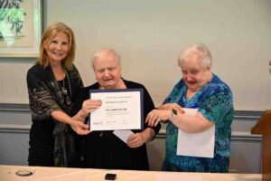 Betsey Lombardi receives Paul Harris award from sister