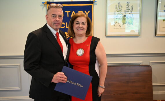 Dr. Matthew Conway and Club President Lucy Andrade